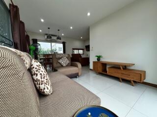 Spacious and modern living room with dining area