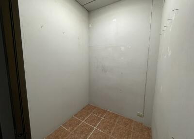 Empty storage room with tiled floor