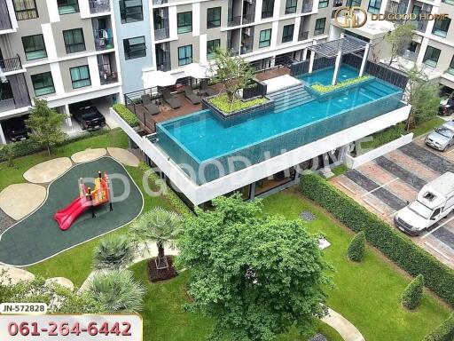 Modern apartment building with pool and playground