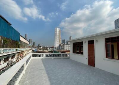 Spacious rooftop terrace with city view
