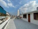 Spacious rooftop terrace with city view