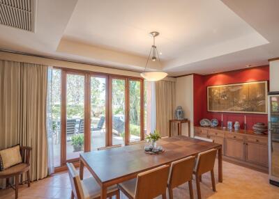 Bright dining room with large windows