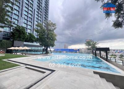 Apartment complex with swimming pool and city view