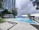 Apartment complex with swimming pool and city view