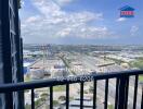 Balcony view overlooking a busy highway and IKEA store