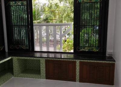 Well-lit living area with large window