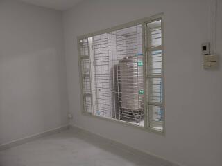 Utility room with water storage tank