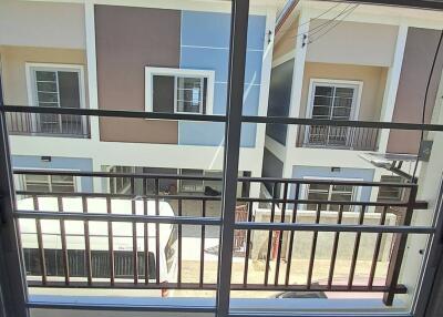 View from balcony towards neighboring buildings