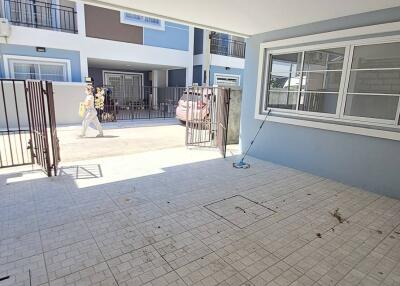 Garage space with tiled flooring and open access