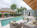 Outdoor seating area and pool with gazebo