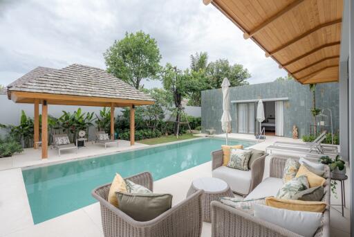 Outdoor seating area and pool with gazebo