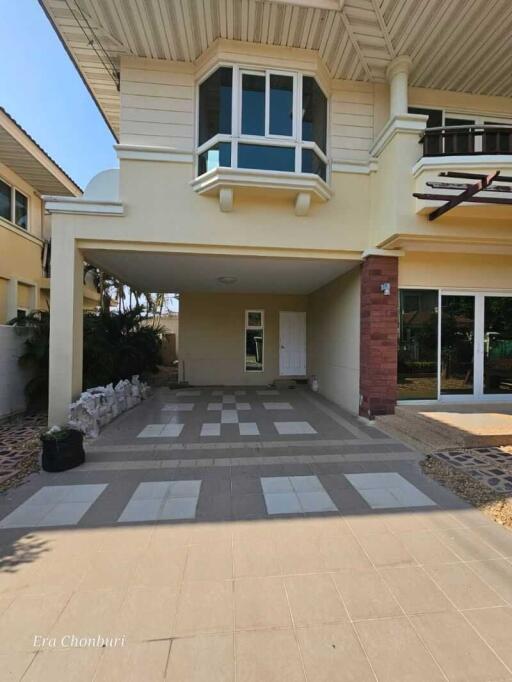 Front view of the house with carport