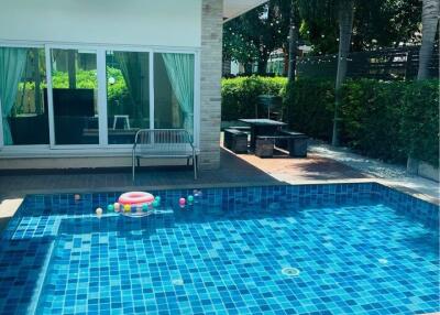 Outdoor patio area with pool