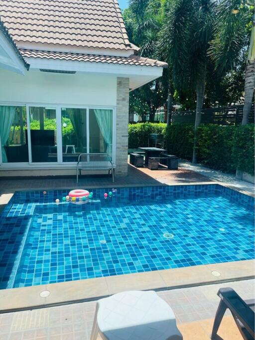 Outdoor patio area with pool