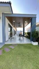 Outdoor patio with seating area and covered roof