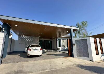 Modern house exterior with carport