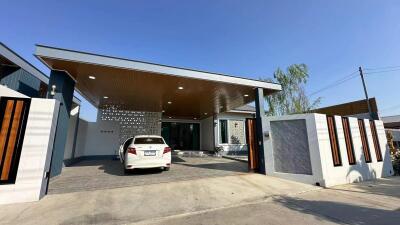 Modern house exterior with carport