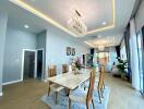 Modern dining area with chandelier