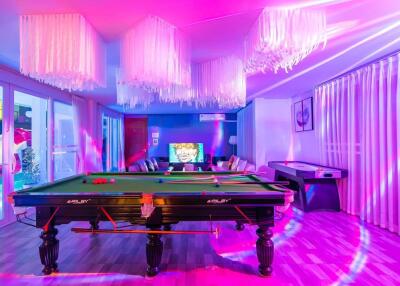 Recreational room with pool table and air hockey table