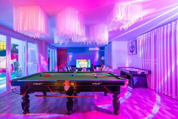 Recreational room with pool table and air hockey table