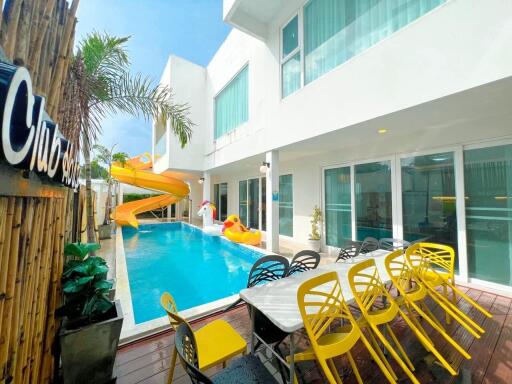 Outdoor area with swimming pool and seating