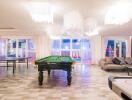 Spacious entertainment room with pool table, ping pong table, and seating area