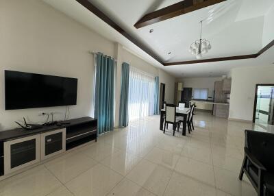 Spacious living room with integrated dining area and modern amenities