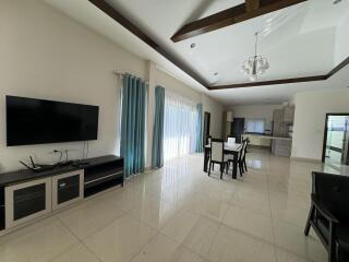 Spacious living room with integrated dining area and modern amenities