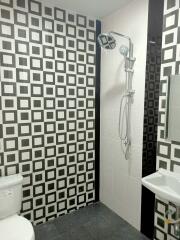 Bathroom with modern square-patterned tiles