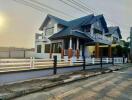 Two-story residential house with front yard