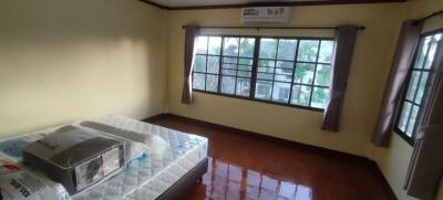 Bedroom with large windows and natural light