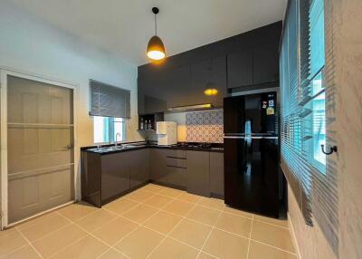 Modern kitchen with sleek cabinets and appliances