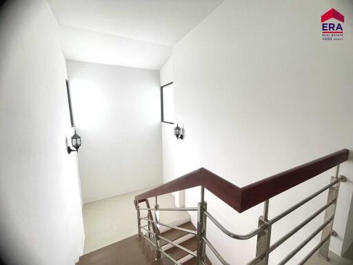 Interior stairway with metal railing