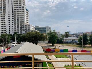 Spacious balcony with a city view