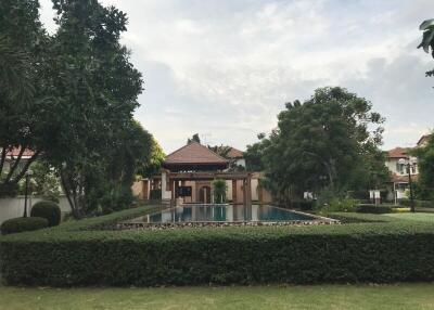 Outdoor garden with a swimming pool