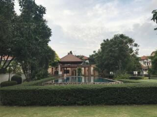 Outdoor garden with a swimming pool