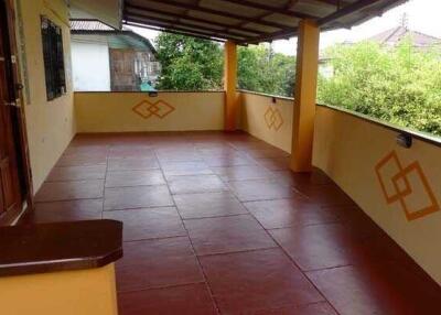 Spacious balcony with tiled flooring