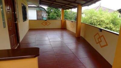 Spacious balcony with tiled flooring