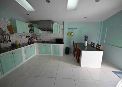 Spacious kitchen with dining area