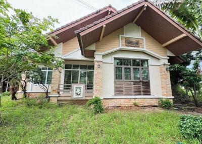 Exterior view of a house with yard