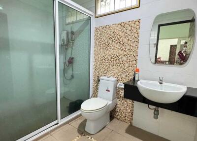 Modern bathroom with enclosed shower