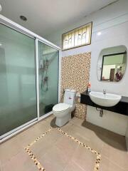 Modern bathroom with enclosed shower