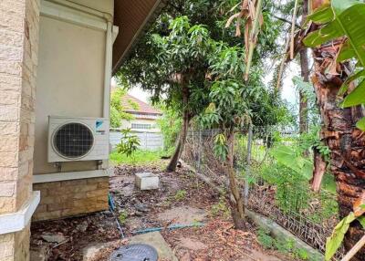 Outdoor side yard with air conditioning unit