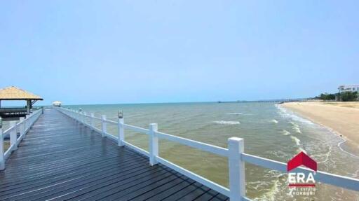 View of a beachfront with a walkway