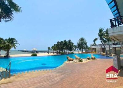 Outdoor pool area with view of the beach