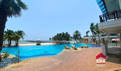 Outdoor pool area with view of the beach