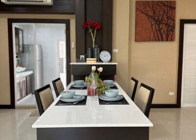 Modern dining room with a set dining table