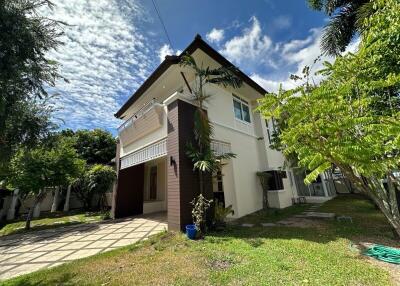 modern two-story house with garden