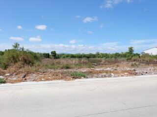 View of vacant land with clear blue sky