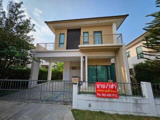 Two-story house with front yard